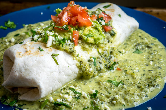 Think of this as the ultimate comfort food. A chicken guacamole burrito swimming in a creamy, goopy poblano sauce with otherworldly flavor. Don't forget to roast the poblano peppers. So good! mexicanplease.com