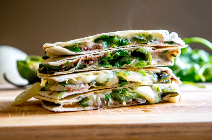 This Roasted Poblano Quesadilla recipe is a great example of the rich, otherworldly flavor that Mexican cuisine can generate by using just a few simple ingredients. And it's served with Avocado Salsa Verde! mexicanplease.com