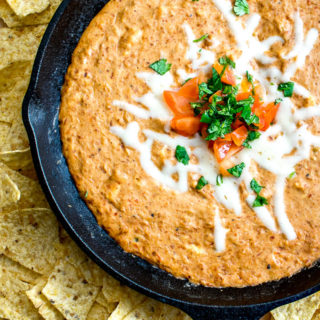 Sure, this Cheesy Bean Dip works great for office parties and family get-togethers, but it tastes better when you make it for yourself :) Chipotles in adobo give the pinto bean puree incredible flavor. So good! mexicanplease.com