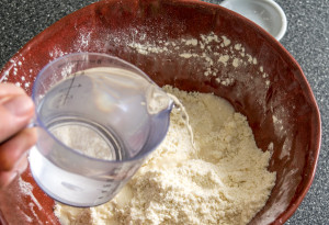 adding water homemade flour tortillas