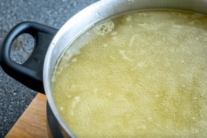 chicken stock with fat glistening on top