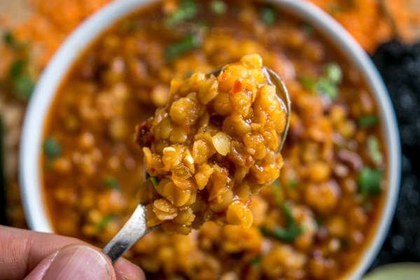Got red lentils handy? This vegetarian Mexican lentil soup is super easy to make and only takes a small bite out of your wallet. mexicanplease.com