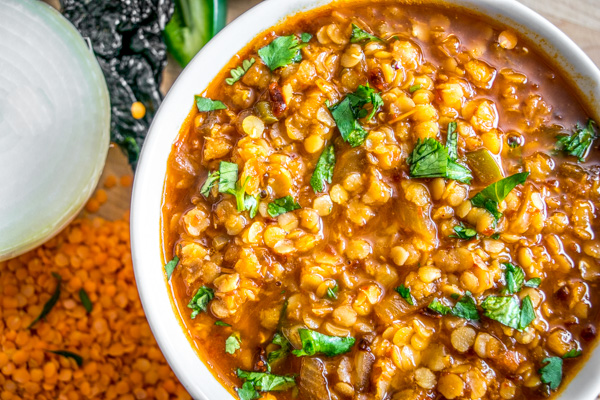 Got red lentils handy? This vegetarian Mexican lentil soup is super easy to make and only takes a small bite out of your wallet. mexicanplease.com
