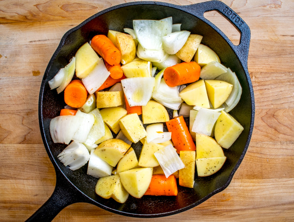 mexican roasted chicken vegetables in cast iron skillet