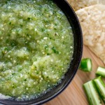 salsa verde with chip and serrano chili peppers