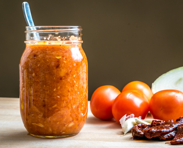 This Tomato Chipotle Salsa has a rich, smoky flavor from the delightful chipotles in adobo. And if you roast the tomatoes you end up with a warm, authentic salsa -- so good! mexicanplease.com