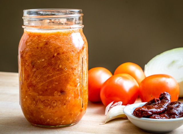 This Tomato Chipotle Salsa has a rich, smoky flavor from the delightful chipotles in adobo. And if you roast the tomatoes you end up with a warm, authentic salsa -- so good! mexicanplease.com