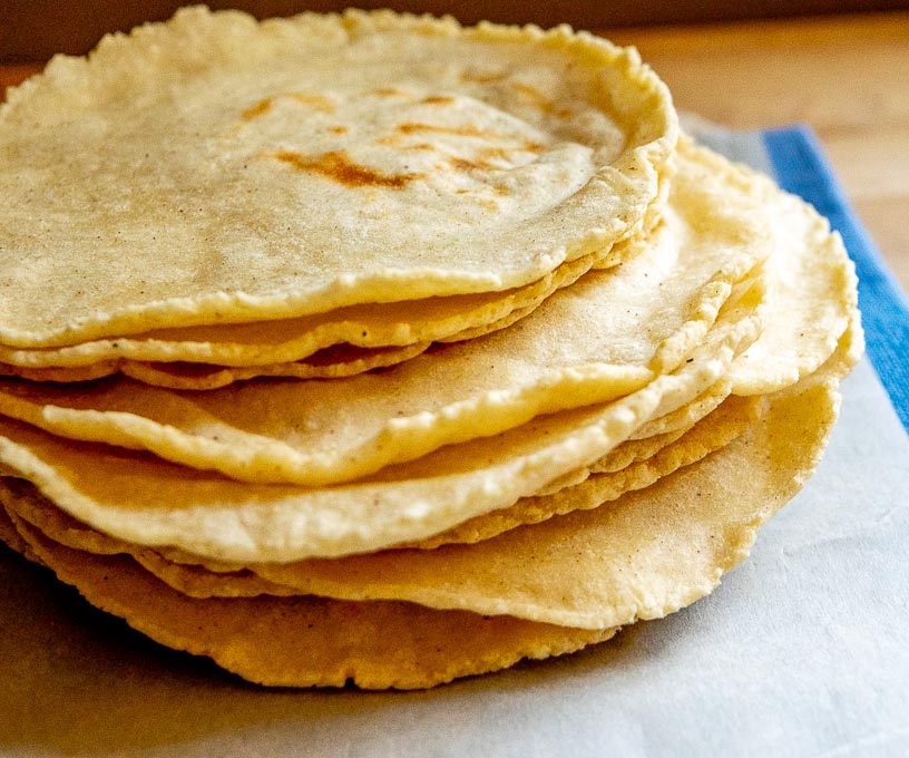 14 corn tortillas after cooking on comal