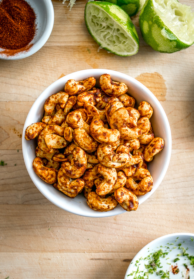 These Chili Lime Peanuts get a burst of Chili-Lime goodness from cayenne pepper and chipotle powder. I used cashews but this recipe works great for regular peanuts too. So good! mexicanplease.com