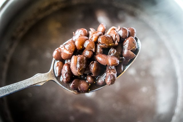 It's surprising how easy it is to make a batch of authentic Mexican pot beans. These Frijoles de Olla not only taste better than storebought beans, they're also very kind to your wallet! mexicanplease.com