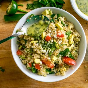 This Quinoa Avocado Salad is ridiculously healthy and tastes great on its own. Add in some Lime Cilantro Dressing and it becomes a keeper!! Buen Provecho. mexicanplease.com