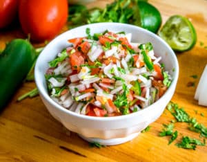 Five ingredients is all it takes to make a classic, authentic Pico de Gallo. This recipe keeps the tomatoes in check by using plenty of onion and seasoning. So good! mexicanplease.com