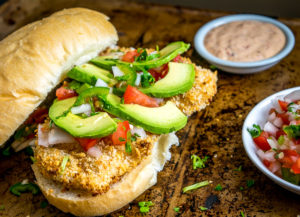 This Baked Milanesa Torta is loaded with avocado, Pico de Gallo and chipotle mayo. Yowsa! No frying either, just bread the chicken cutlets and give 'em 12 minutes in the oven. Buen Provecho. mexicanplease.com
