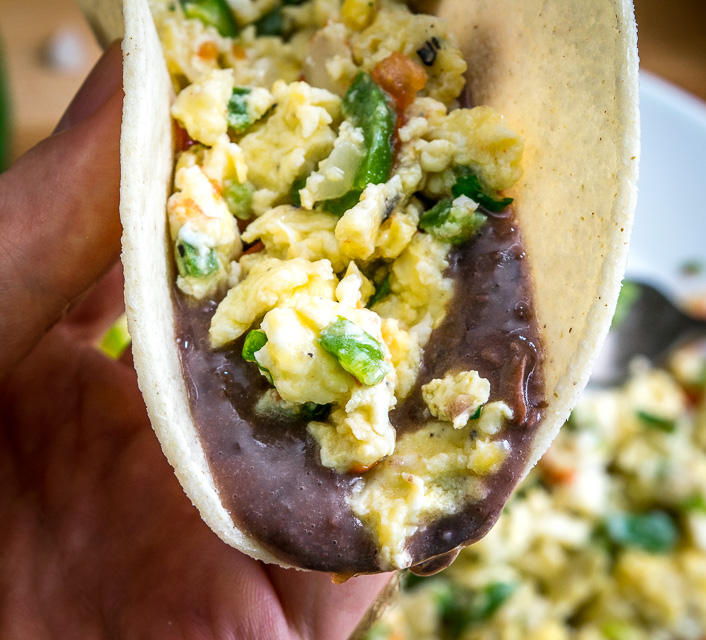 These Mexican Scrambled Eggs are perfect for lazy weekend mornings: well-balanced, easy to make, and they have real kick. Try draining the tomatoes before adding them to the pan, so much better! mexicanplease.com