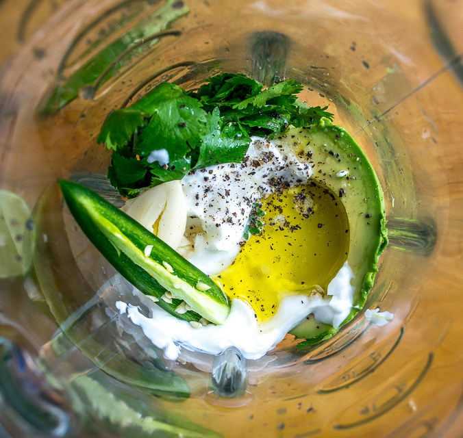 These Easy Burrito Bowls have a secret weapon that can instantly save your day: creamy avocado sauce with some zip from a jalapeno. So good! mexicanplease.com