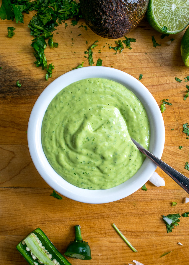 These Easy Burrito Bowls have a secret weapon that can instantly save your day: creamy avocado sauce with some zip from a jalapeno. So good! mexicanplease.com