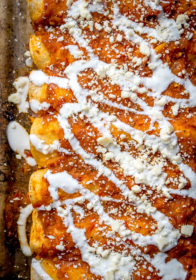 red-sauce-enchiladas-with-crema-and-cotija-sheetpan