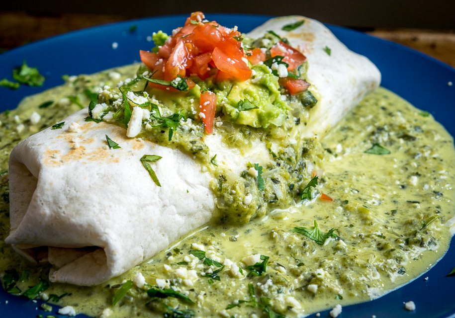 Think of this as the ultimate comfort food. A chicken guacamole burrito swimming in a creamy, goopy poblano sauce with otherworldly flavor. Don't forget to roast the poblano peppers. So good! mexicanplease.com