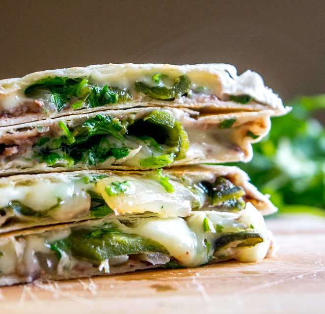 This Roasted Poblano Quesadilla recipe is a great example of the rich, otherworldly flavor that Mexican cuisine can generate by using just a few simple ingredients. And it's served with Avocado Salsa Verde! mexicanplease.com