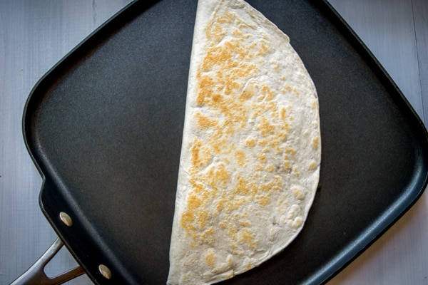 This Roasted Poblano Quesadilla recipe is a great example of the rich, otherworldly flavor that Mexican cuisine can generate by using just a few simple ingredients. And it's served with Avocado Salsa Verde! mexicanplease.com