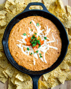 Sure, this Cheesy Bean Dip works great for office parties and family get-togethers, but it tastes better when you make it for yourself :) Chipotles in adobo give the pinto bean puree incredible flavor. So good! mexicanplease.com