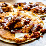 Ancho and New Mexican dried chilis create a delicious Colorado Sauce that's served up taco style with chipotle infused refried beans and grilled chicken. So good! mexicanplease.com