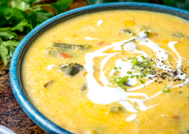 This Corn and Poblano Soup has a perfect balance between the corn and the roasted poblanos. A drizzle of cream and a final dash of acidity turn it into a keeper! mexicanplease.com