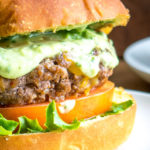 Spicing up your cheeseburgers with chipotles might convert you over for life. And when drenched in a creamy avocado sauce you just made the best burger in town. So good! mexicanplease.com