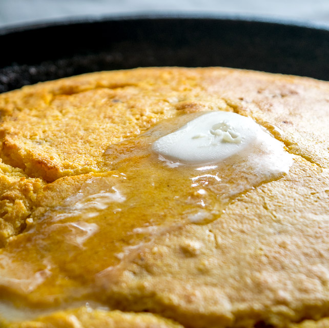 Chipotles give this skillet cornbread the perfect hint of spice and when served fresh out of the oven with a pad of butter you'll be in heaven! mexicanplease.com