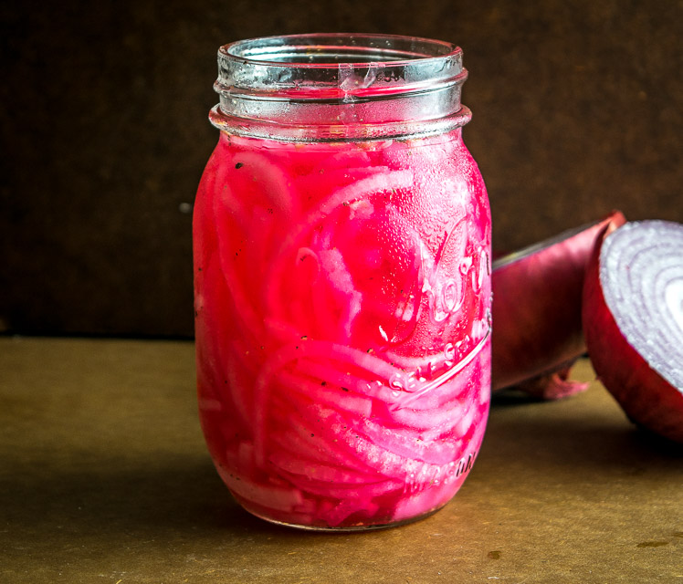 Here's an easy recipe for a quick batch of delightful pickled onions. You can use these on sandwiches, tacos, tostadas, or anything that needs a final dash of zip to liven it up. So good! mexicanplease.com