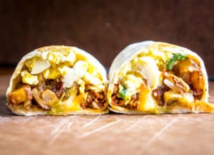 It would be easy to give all the credit to the chorizo in these epic breakfast burritos. But it's the tomatillo salsa that really amps them up. So good! mexicanplease.com