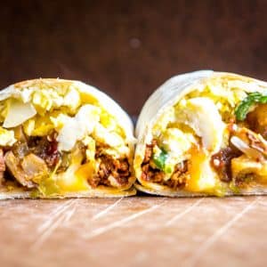 It would be easy to give all the credit to the chorizo in these epic breakfast burritos. But it's the tomatillo salsa that really amps them up. So good! mexicanplease.com