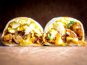 It would be easy to give all the credit to the chorizo in these epic breakfast burritos. But it's the tomatillo salsa that really amps them up. So good! mexicanplease.com