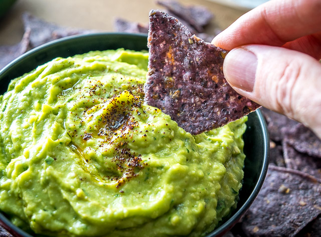 If you're new to Avocado Hummus you're in for a treat! Avocados and chickpeas combine to make this one of the creamiest, most delicious dips you'll ever have. So good! mexicanplease.com