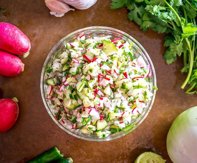 This Cucumber Radish Salsa is a great example of how easy it can be to build salsas that don't rely on tomatoes or tomatillos. A light, vibrant salsa that works great on tacos, tostadas, and even pita bread. mexicanplease.com