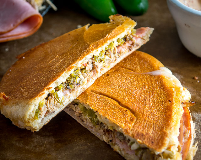 A delicious update on the classic Cuban Sandwich. We are using pickled jalapenos and chipotle mayo in place of the pickles and mustard. Works great with leftover carnitas! mexicanplease.com 