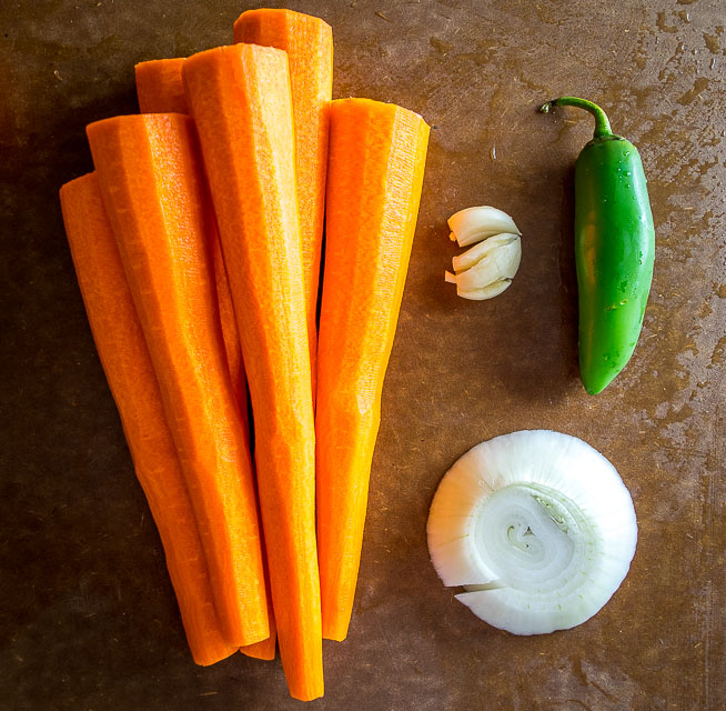 These Mexican Pickled Carrot Sticks want to be in your life! Crispy, delicious, and full of zip from the jalapeno. Super easy to make too. mexicanplease.com