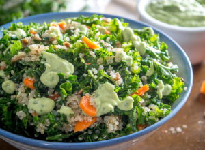 A light, zippy Kale and Quinoa Salad drenched in a yogurt based Creamy Avocado Dressing. As healthy as it gets with loads of flavor. So good! mexicanplease.com