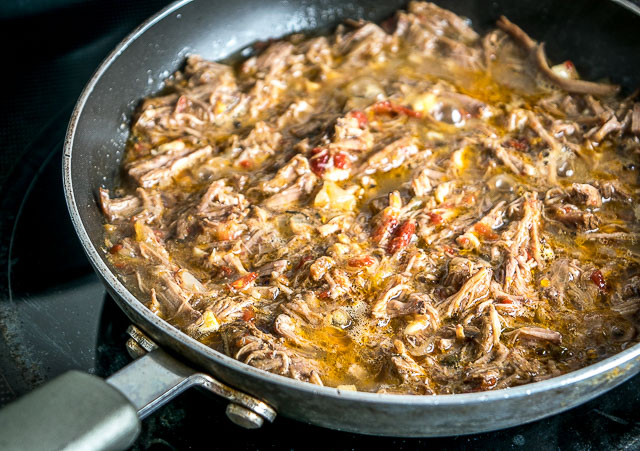 Freshly made Pico de Gallo combines with Barbacoa Beef and Guacamole to make these burritos sing! Slow cooker barbacoa works great but feel free to use any shredded beef you have on hand. So good! mexicanplease.com