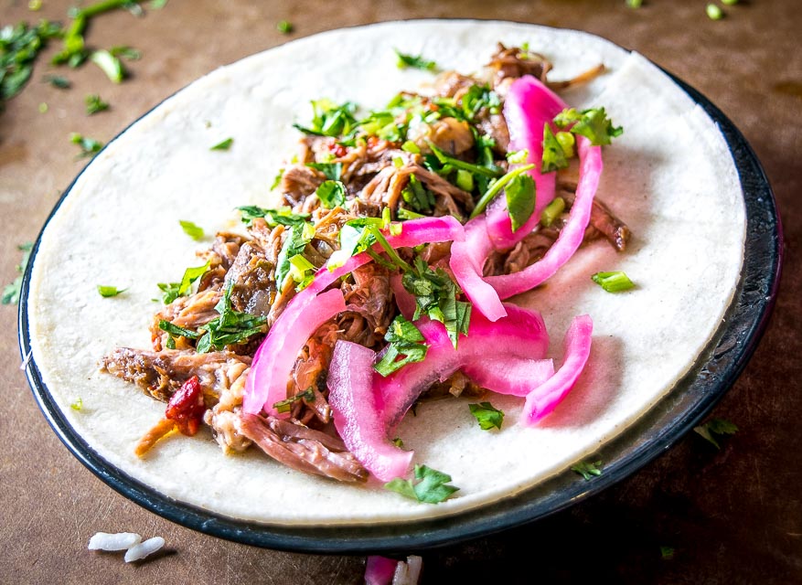 This stress-free slow cooker beef barbacoa can be used in so many delicious ways: tacos, burritos, enchiladas -- you can even serve it over rice for an instant meal. So good! mexicanplease.com