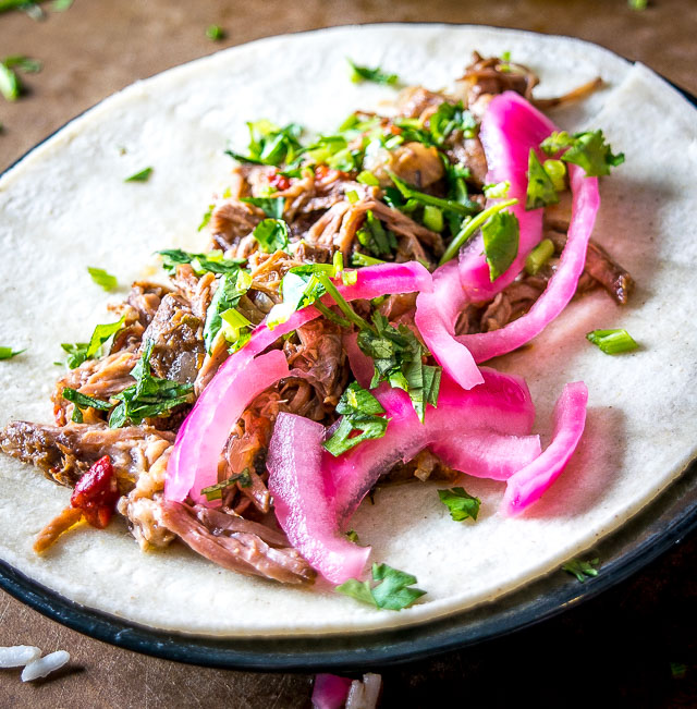 This stress-free slow cooker beef barbacoa can be used in so many delicious ways: tacos, burritos, enchiladas -- you can even serve it over rice for an instant meal. So good! mexicanplease.com