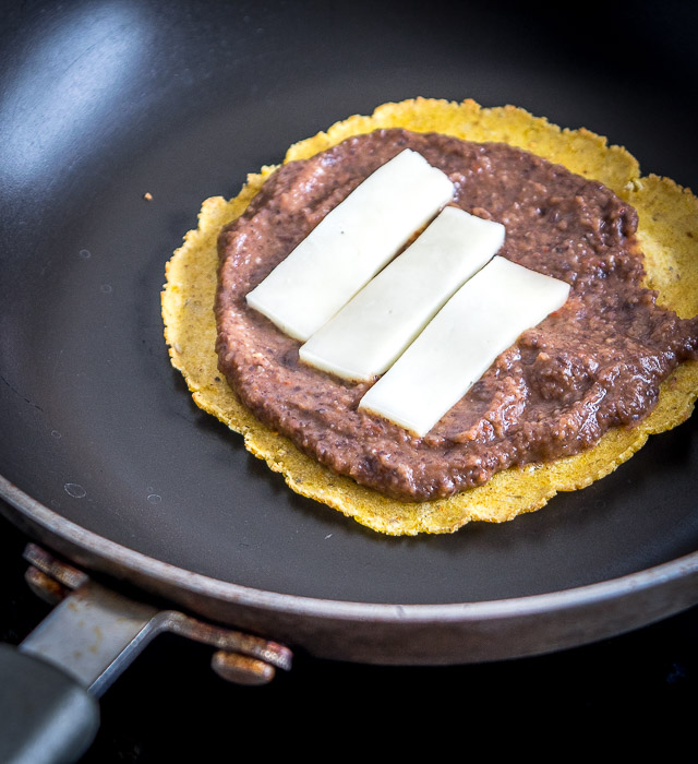 saute bean puree and cheese for tostadas