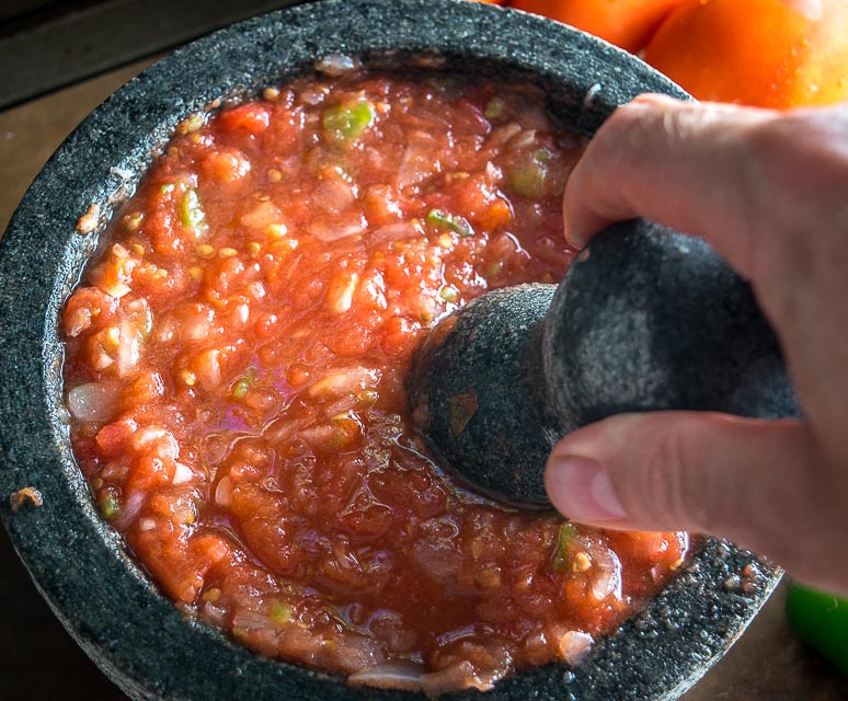 You might be surprised the first time you try salsa made in a molcajete. Crushing the veggies releases additional oils and creates an explosion of flavor that traditional salsas don't have. So good! mexicanplease.com