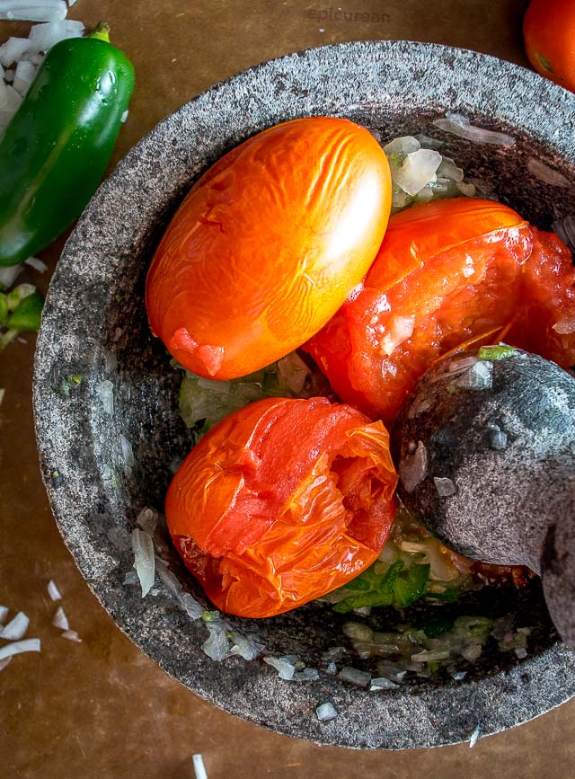 You might be surprised the first time you try salsa made in a molcajete. Crushing the veggies releases additional oils and creates an explosion of flavor that traditional salsas don't have. So good! mexicanplease.com