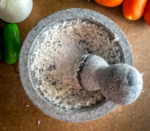 You might be surprised the first time you try salsa made in a molcajete. Crushing the veggies releases additional oils and creates an explosion of flavor that traditional salsas don't have. So good! mexicanplease.com