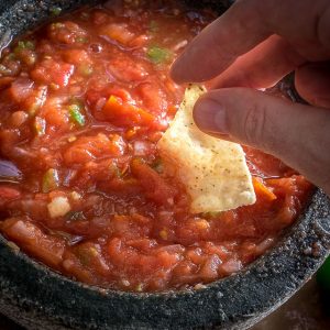 You might be surprised the first time you try salsa made in a molcajete. Crushing the veggies releases additional oils and creates an explosion of flavor that traditional salsas don't have. So good! mexicanplease.com