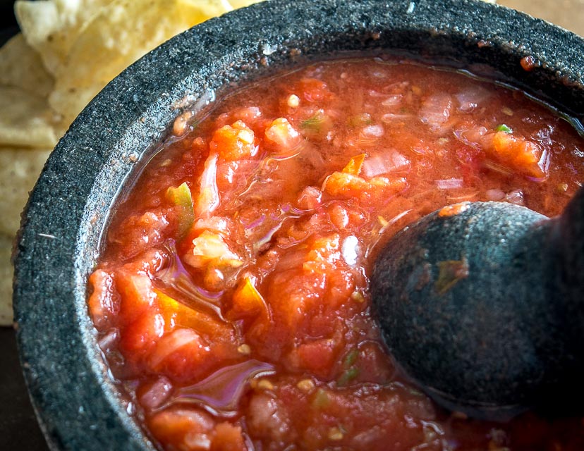 You might be surprised the first time you try salsa made in a molcajete. Crushing the veggies releases additional oils and creates an explosion of flavor that traditional salsas don't have. So good! mexicanplease.com