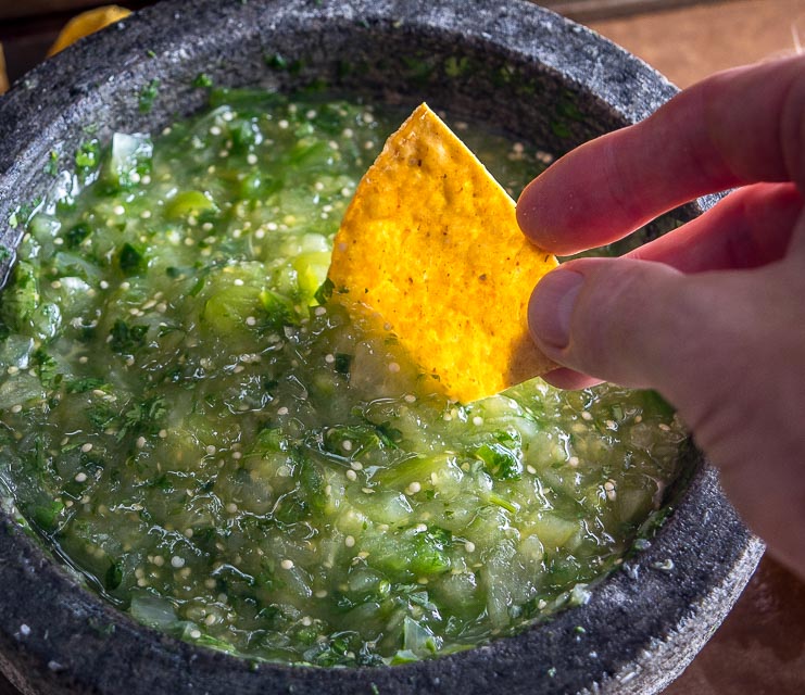 The flavor you can generate by smooshing ingredients in a molcajete is unreal. You'll end up with a vibrant batch of Salsa Verde that could potentially cause you to break up with the other salsas in your life. mexicanplease.com 