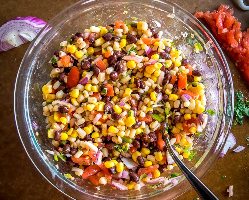 This wildly versatile Black Bean and Corn Salsa will have you dreaming up all sorts of ways to use it: tacos, salads, even wraps! I think it tastes best when the lime flavor is at the forefront so feel to add another squeeze! mexicanplease.com