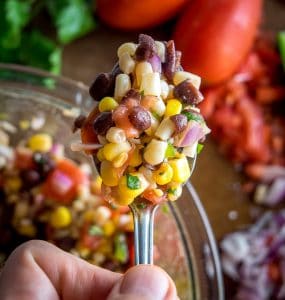 This wildly versatile Black Bean and Corn Salsa will have you dreaming up all sorts of ways to use it: tacos, salads, even wraps! I think it tastes best when the lime flavor is at the forefront so feel to add another squeeze! mexicanplease.com